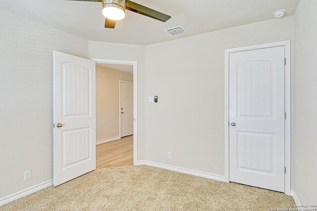 13351 Welsh Pony, San Antonio, TX 78254 - unfurnished bedroom featuring light colored carpet, baseboards, and ceiling fan
