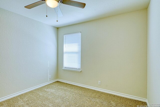 13351 Welsh Pony, San Antonio, TX 78254 - unfurnished room featuring light colored carpet, baseboards, and ceiling fan