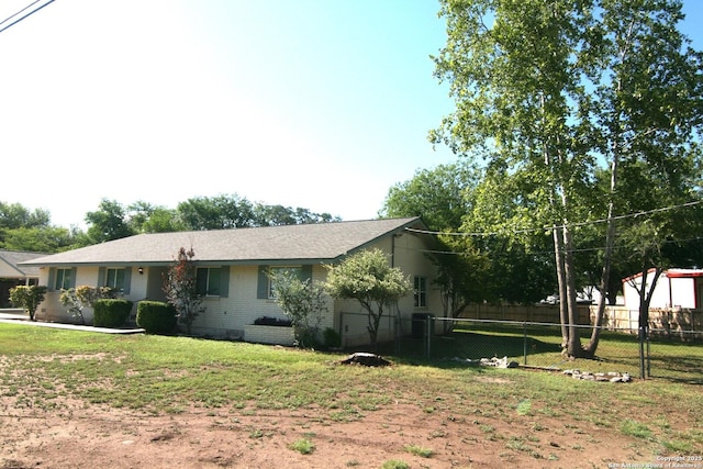 206 Alvina, Castroville, TX 78009 - view of front of house featuring brick siding