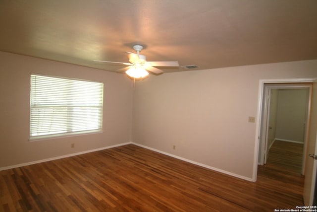 206 Alvina, Castroville, TX 78009 - unfurnished room featuring a ceiling fan, baseboards, and wood finished floors