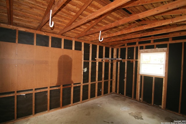 206 Alvina, Castroville, TX 78009 - misc room with unfinished concrete floors