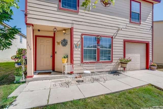 5439 Kensington Run, San Antonio, TX 78228 - doorway to property with an attached garage