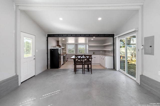 30951 Blanco Rd, Bulverde, TX 78163 - dining space featuring electric panel, finished concrete flooring, recessed lighting, and lofted ceiling