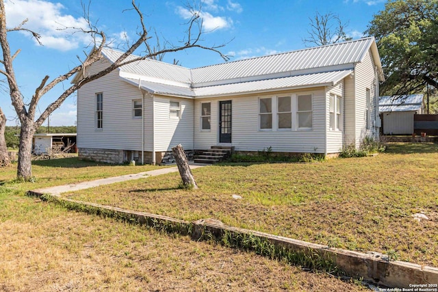 30951 Blanco Rd, Bulverde, TX 78163 - view of front of home featuring metal roof and a front yard