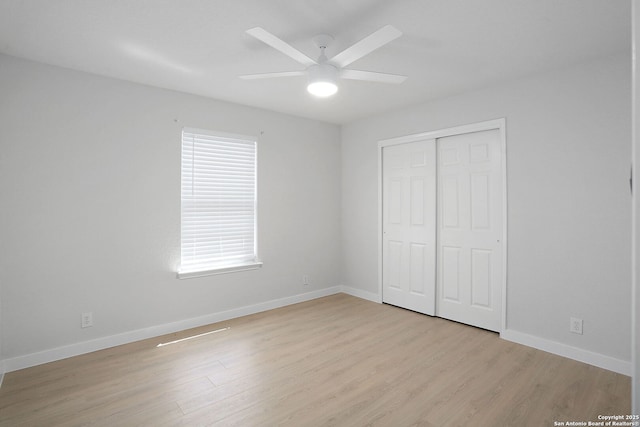 9814 Shawnee, Converse, TX 78109 - unfurnished bedroom featuring light wood-style floors, baseboards, a closet, and a ceiling fan