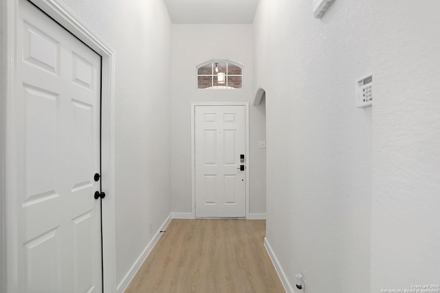 9814 Shawnee, Converse, TX 78109 - doorway with light wood-style floors and baseboards