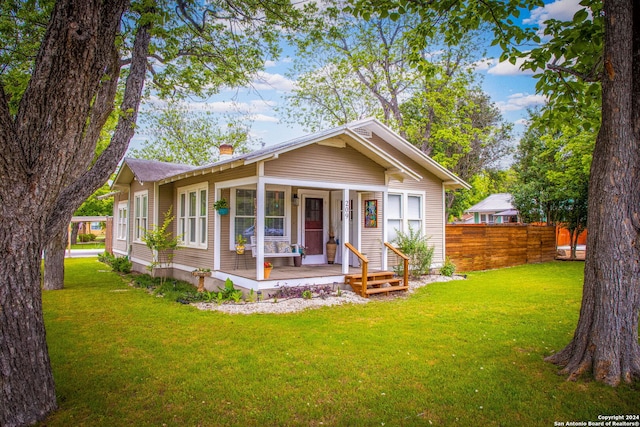 209 S Live Oak, New Braunfels, TX 78130 - view of front facade with a chimney and covered porch
