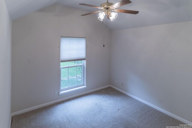 424 Mount Joy, New Braunfels, TX 78130 - carpeted spare room featuring lofted ceiling, a ceiling fan, and baseboards