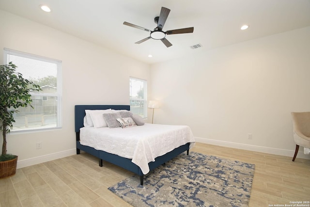 1526 Norfleet, San Antonio, TX 78208 - bedroom with light wood finished floors, baseboards, recessed lighting, and a ceiling fan