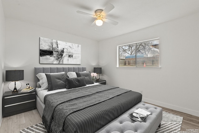 4419 El Simpatico, San Antonio, TX 78233 - bedroom featuring wood finished floors, baseboards, and ceiling fan
