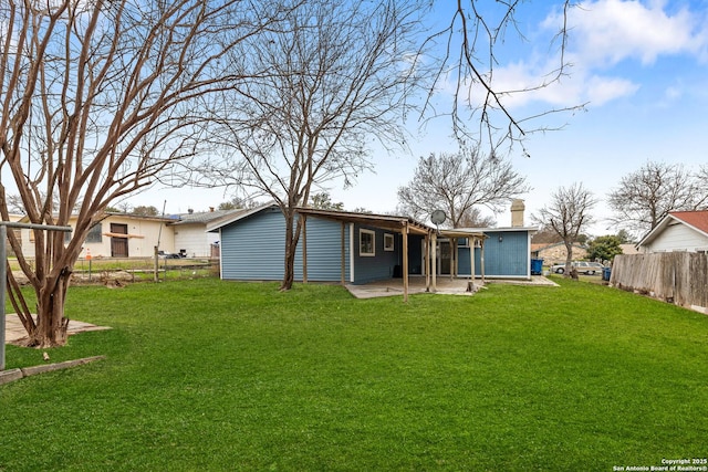 4419 El Simpatico, San Antonio, TX 78233 - back of property with a patio area and a chimney