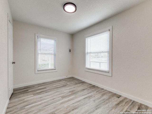 815 Flanders, San Antonio, TX 78211 - empty room featuring light wood-style flooring and baseboards