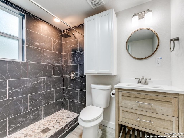 815 Flanders, San Antonio, TX 78211 - full bath with vanity, toilet, and tiled shower