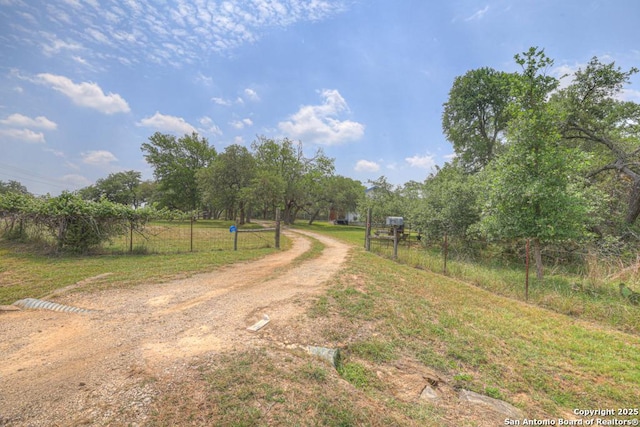 163 Eden Rnch, Canyon Lake, TX 78133 - view of dirt / gravel road with a view of rural / pastoral area