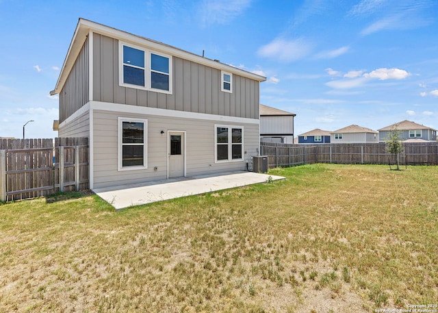 3175 Wild Indigo, New Braunfels, TX 78130 - back of house with board and batten siding, central AC, and a patio