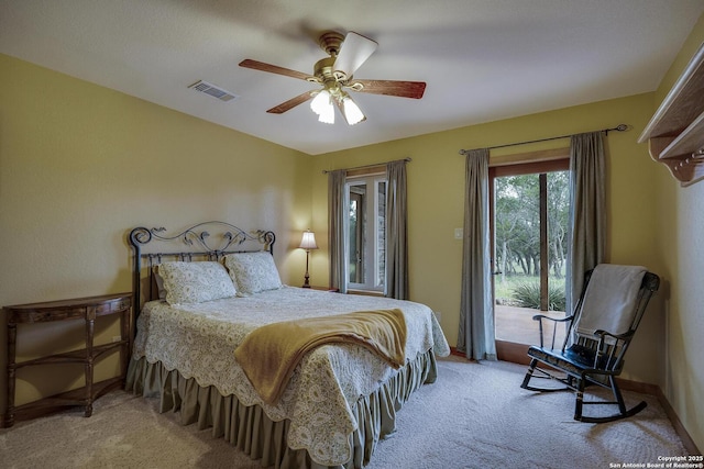 121 N Spanish Oak Trl, Kerrville, TX 78028 - carpeted bedroom featuring access to outside and ceiling fan