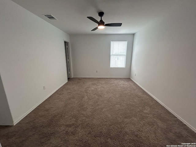 614 Agave, Jourdanton, TX 78026 - spare room with a ceiling fan, carpet, and baseboards