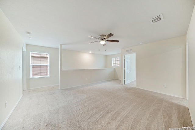 7341 Yucca Pl, San Antonio, TX 78253 - spare room with a ceiling fan, light carpet, and healthy amount of natural light