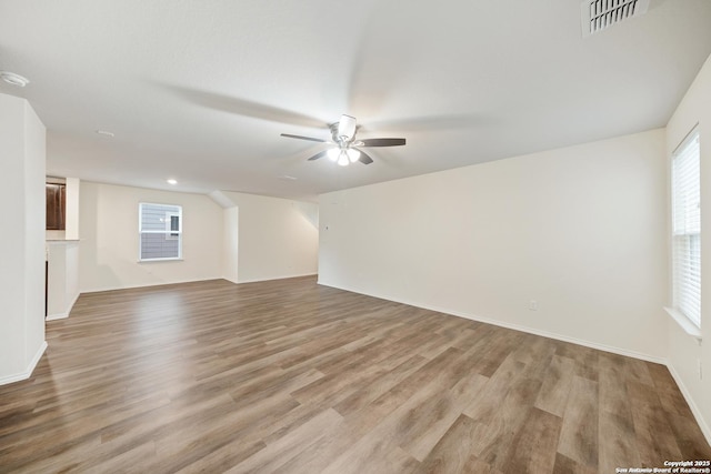 7341 Yucca Pl, San Antonio, TX 78253 - empty room with a ceiling fan, wood finished floors, and baseboards