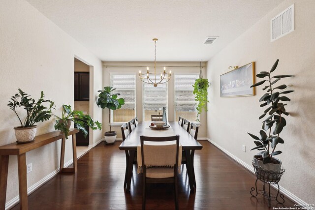 32003 Cast Iron, Bulverde, TX 78163 - dining space with a chandelier, dark wood finished floors, and baseboards