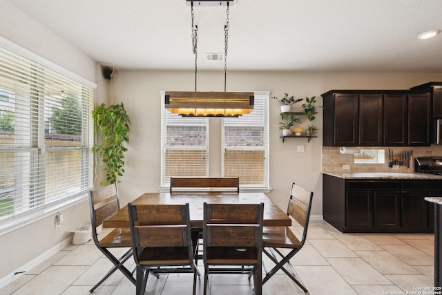 32003 Cast Iron, Bulverde, TX 78163 - dining area with light tile patterned flooring, baseboards, a chandelier, and recessed lighting