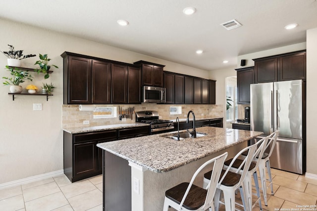 32003 Cast Iron, Bulverde, TX 78163 - kitchen with appliances with stainless steel finishes, a sink, tasteful backsplash, baseboards, and recessed lighting