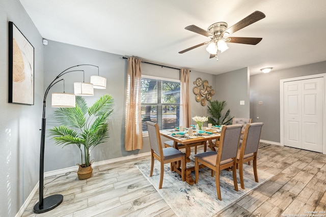 5802 Branch Vly, San Antonio, TX 78242 - dining area featuring baseboards, light wood finished floors, and ceiling fan