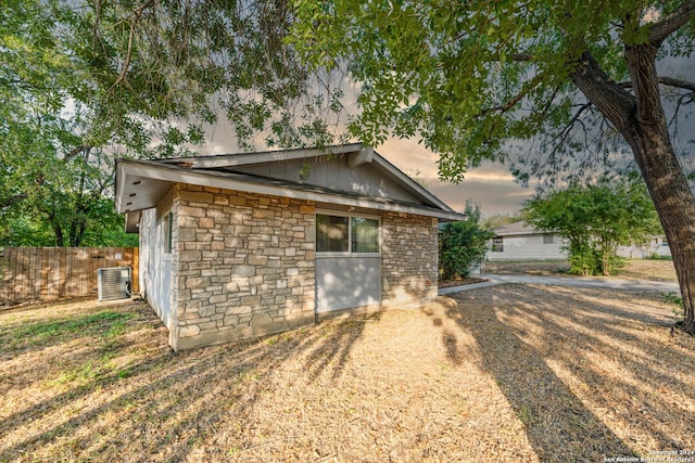 5802 Branch Vly, San Antonio, TX 78242 - back of house with stone siding and central AC