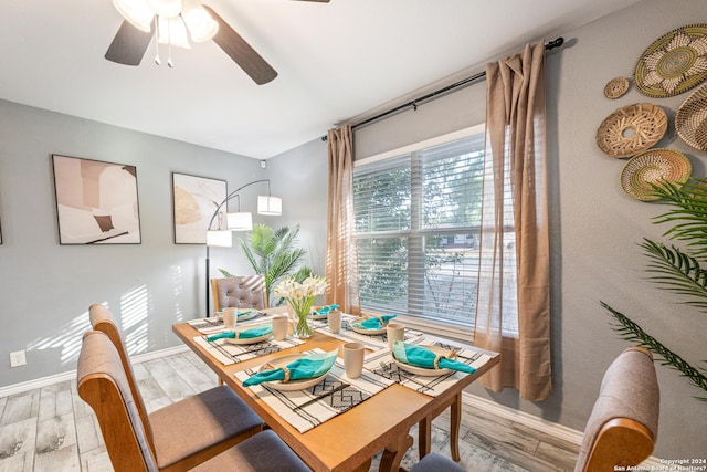 5802 Branch Vly, San Antonio, TX 78242 - dining space featuring baseboards, ceiling fan, and light wood-style flooring
