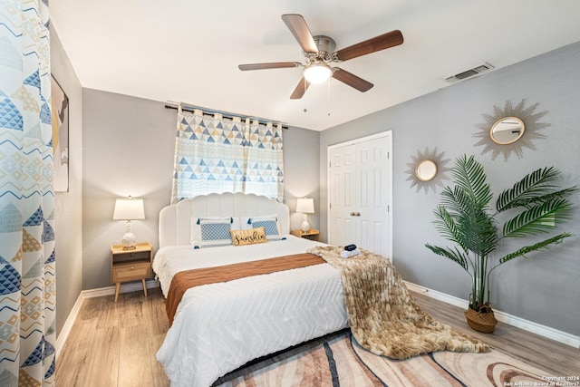 5802 Branch Vly, San Antonio, TX 78242 - bedroom with wood finished floors, baseboards, ceiling fan, and a closet