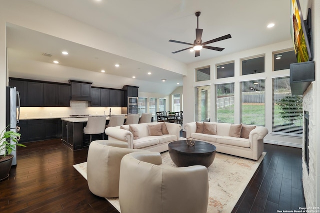 24321 Downhill Lie, San Antonio, TX 78261 - living room with ceiling fan, dark wood finished floors, recessed lighting, and vaulted ceiling