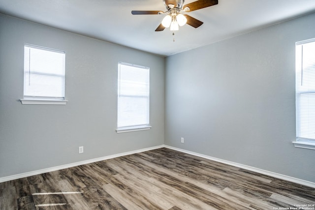 510 Hampton Cv, Boerne, TX 78006 - empty room featuring dark wood finished floors, baseboards, and ceiling fan