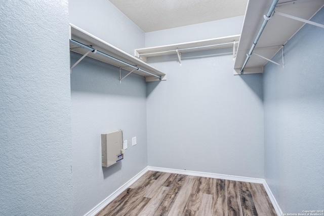 510 Hampton Cv, Boerne, TX 78006 - spacious closet with wood finished floors