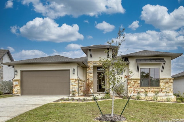 23350 Grande Vis, San Antonio, TX 78261 - prairie-style house with stone siding, a garage, driveway, and a front yard