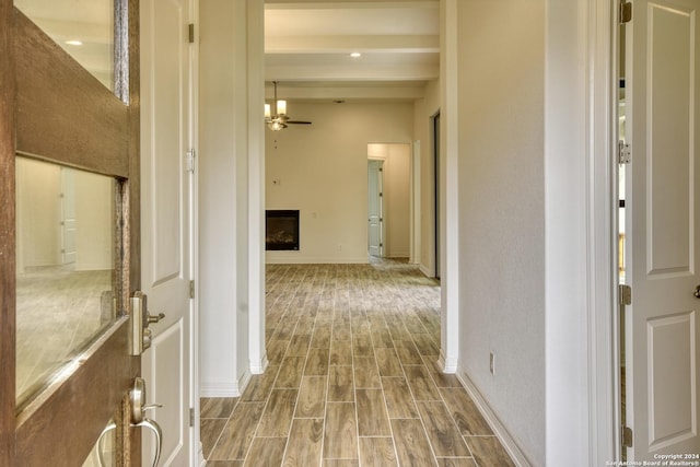 23350 Grande Vis, San Antonio, TX 78261 - hallway featuring wood finished floors, beamed ceiling, and baseboards
