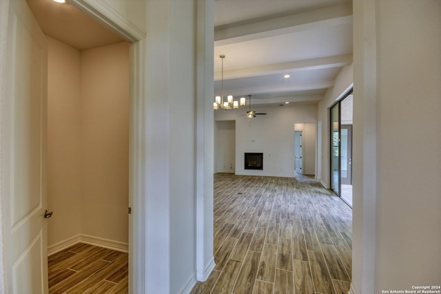 23350 Grande Vis, San Antonio, TX 78261 - corridor featuring wood finished floors, a chandelier, beamed ceiling, and baseboards
