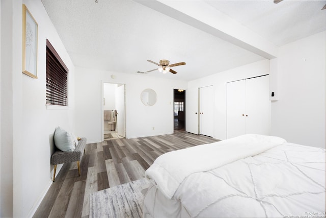 7035 Forest Mdw, San Antonio, TX 78240 - bedroom with multiple closets, wood finished floors, baseboards, ensuite bath, and ceiling fan