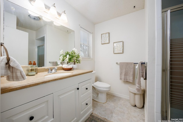 7035 Forest Mdw, San Antonio, TX 78240 - bathroom featuring vanity, a stall shower, toilet, baseboards, and tile patterned flooring