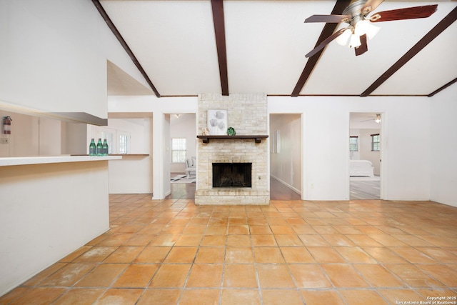 7035 Forest Mdw, San Antonio, TX 78240 - unfurnished living room featuring ceiling fan, beam ceiling, a fireplace, high vaulted ceiling, and light tile patterned floors