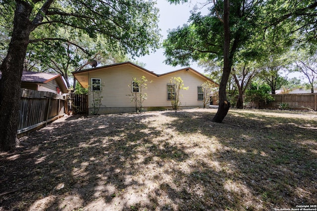7035 Forest Mdw, San Antonio, TX 78240 - rear view of house with a fenced backyard