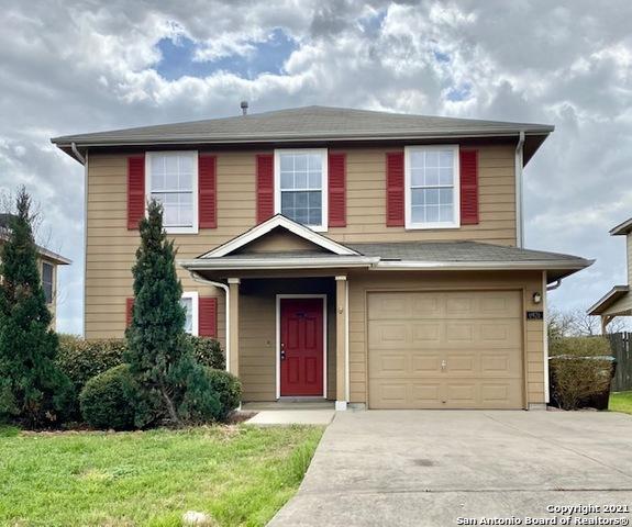 6926 Lunar Way, San Antonio, TX 78109 - view of front of house with a garage, concrete driveway, and a front yard