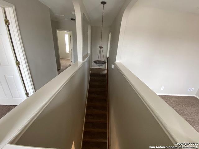 6926 Lunar Way, San Antonio, TX 78109 - hall with carpet floors and baseboards