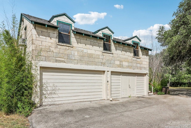 7735 Mocking Bird Ln, San Antonio, TX 78229 - garage featuring asphalt driveway