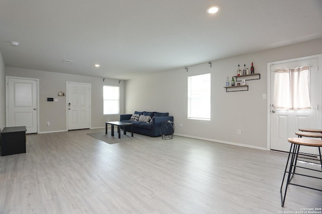 10787 Giacconi, Converse, TX 78109 - living room featuring light wood-style flooring, baseboards, and recessed lighting