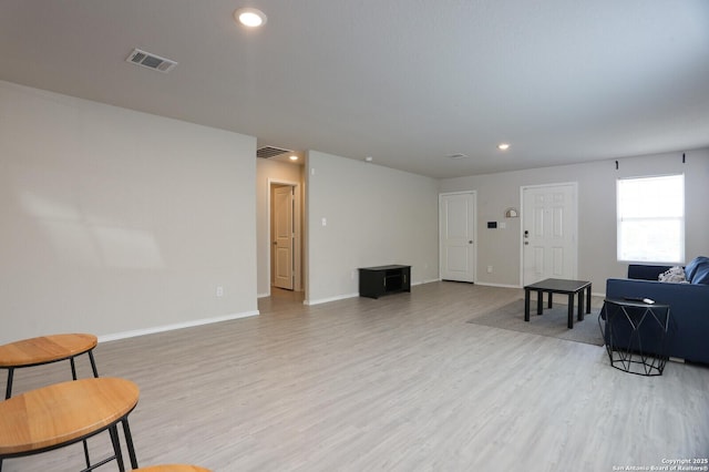 10787 Giacconi, Converse, TX 78109 - living area featuring light wood finished floors, baseboards, and recessed lighting