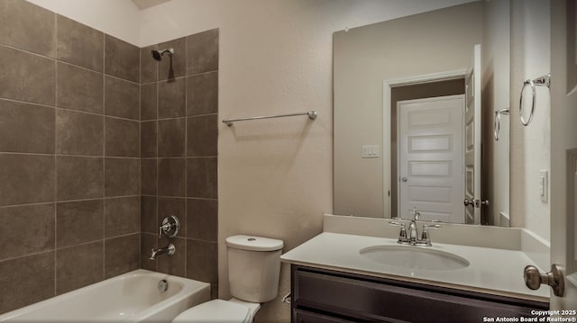 4506 Wild Goose, San Antonio, TX 78245 - bathroom featuring vanity, toilet, and bathtub / shower combination