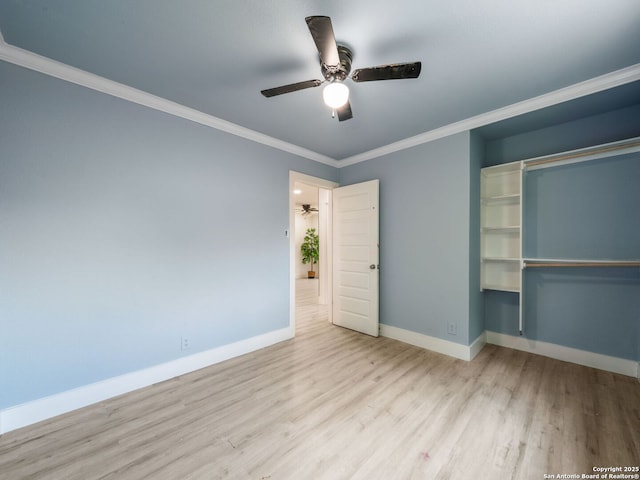 11105 Lone Shadow, Live Oak, TX 78233 - unfurnished bedroom featuring wood finished floors, baseboards, a closet, crown molding, and a ceiling fan
