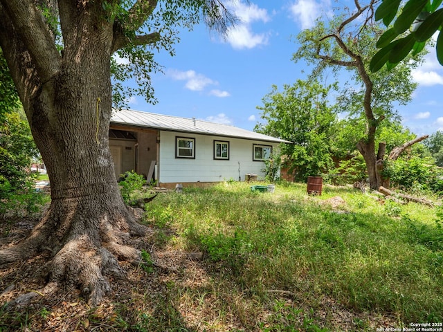 11105 Lone Shadow, Live Oak, TX 78233 - rear view of property featuring metal roof