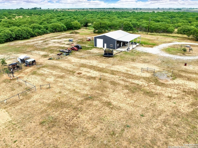 757 Joy, Floresville, TX 78114 - aerial view of sparsely populated area featuring a heavily wooded area