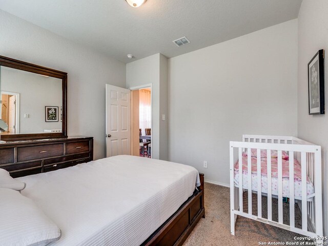 607 Pleasanton Spg, San Antonio, TX 78221 - bedroom with carpet flooring and baseboards